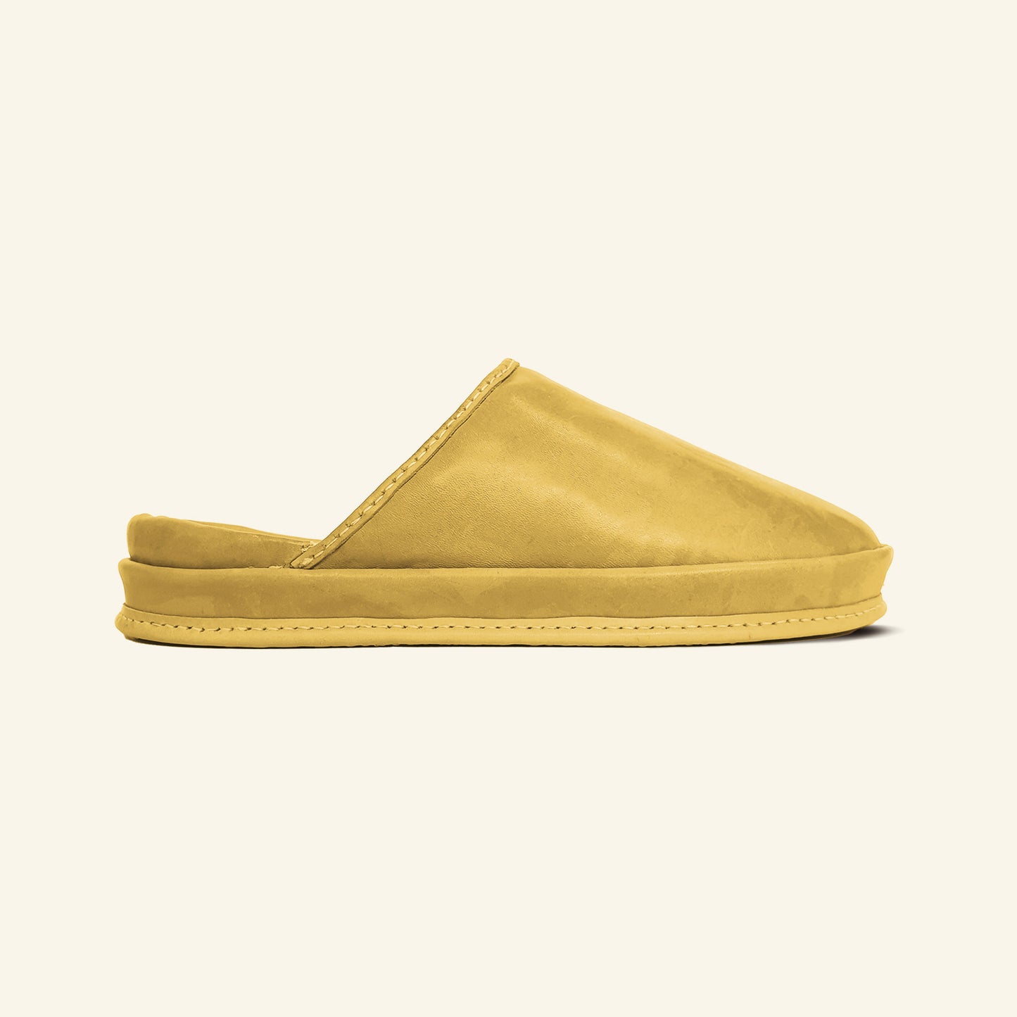 SPA GAIT Sun Husk brown leather clogs photographed on white background. Anatomical shoes with warm golden tone and adaptive fit.