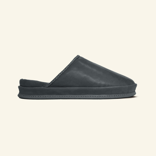 SPA GAIT Storm Ash brown leather clogs on white background. Anatomical shoes made from vegetable-tanned leather. Slip-on leather clogs with adaptive footbed for everyday comfort.