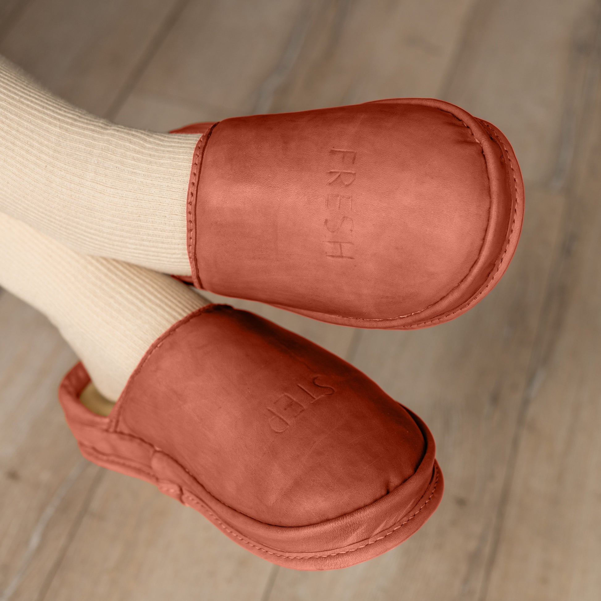 Comfortable anatomical Terracotta Ember leather clogs lifestyle. Soft Terracotta Ember clogs everyday wear. 