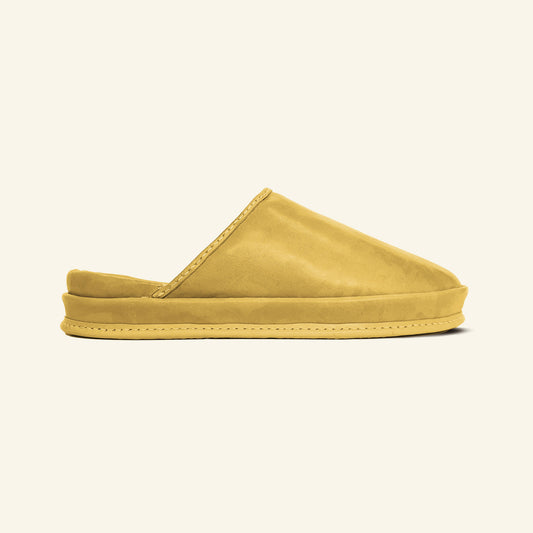 SPA GAIT Sun Husk brown leather clogs photographed on white background. Anatomical shoes with warm golden tone and adaptive fit.